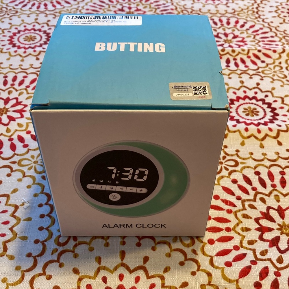 NWOT Butting kids alarm clock. Digital Alarm Clock
